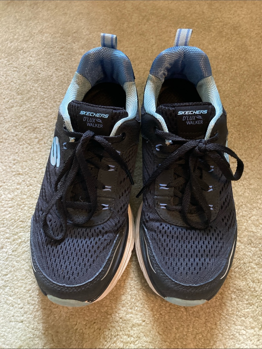 Skechers women’s Black Athletic Sneakers with Light Blue Accents